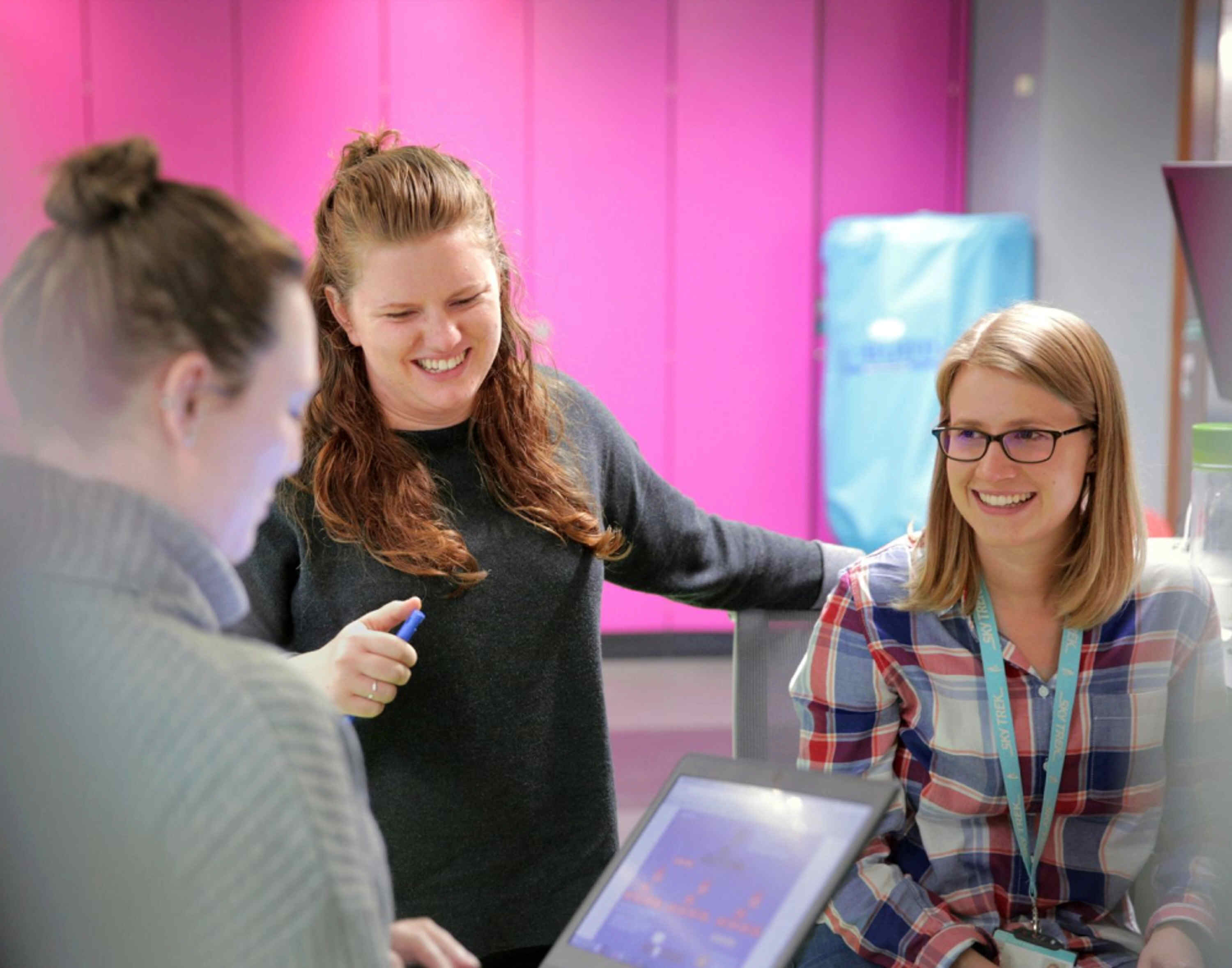 Employees collaborating at Skyscanner